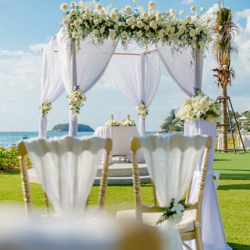 Wedding after-party at a Phuket beach club with DJ booth and LED dance floor